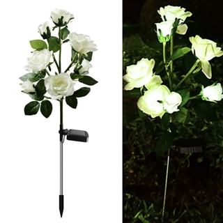 Solcellelampe med hvide roser og grønne blade 